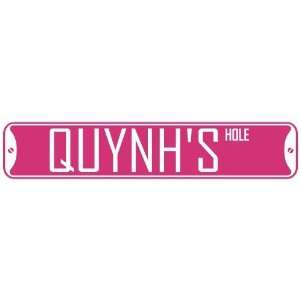   QUYNH HOLE  STREET SIGN