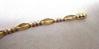 Ladies 14k yellow gold and Diamond tennis bracelet. Bracelet measures 