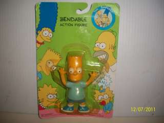 LAST BUT NOT LEAST, IS A BENDABLE ACTION FIGURE   {MAGGIE SIMPSON 