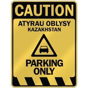   CAUTION ATYRAU OBLYSY PARKING ONLY  PARKING SIGN 