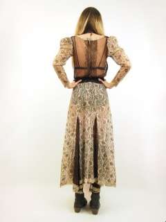   High waistline. Dramatic skirt. Additional lace details dress in all