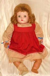The following auction is for a Vintage Composition Baby Doll