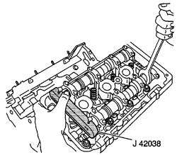  holding fixture J 42038 installed on the camshafts 3.5L (VIN H) engine