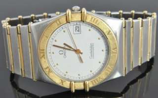 Solid 18K yellow gold bezel with beautifully engraved Roman numerals