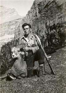 HUNTER WITH A TROPHY BIG HORN SHEEP RIFLE HUNTING PHOTO  