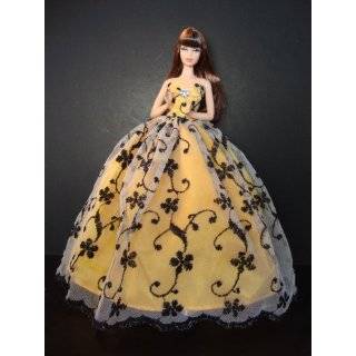 Golden Yellow Ball Gown with See Thru Lace with a Black Swirl Pattern 