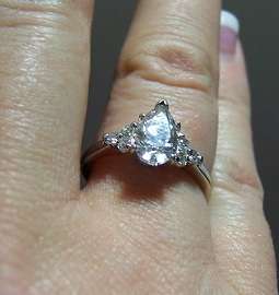 White Gold 1.5 carat (center stone) pear shaped diamond ring w/accent 