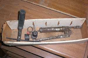 USED SMALL GREASE GUN AND OTHER PARTS  