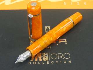 main detail brand delta name dolce vita oversize orange silver trim 