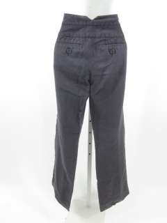   navy blue 4 button pants in a size 4 these pants feature decorative 4