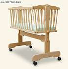 Beautiful Wooden 100% Solid wood Baby Swinging Crib on casters.