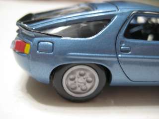 NZG (Germany) Metallic Light Blue Porsche 928S Diecast 143  
