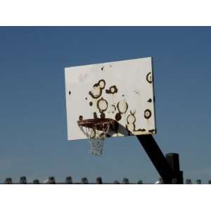  Basketball Net Hoop and Backboard against a Blue Sky 
