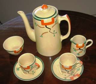 Clarice Cliff Coffee Set 9 pieces and a Canister Lid  