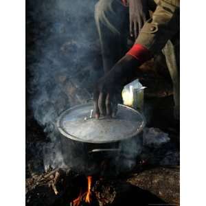  A Man, 24, from Ghana, Prepares His Meal Photographic 
