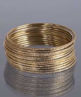 Chamak by Priya Kakkar set of 12  gold textured metal thin bangles 